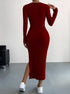 Back view of deep red ribbed midi dress highlighting fitted design and side slit with white sneakers