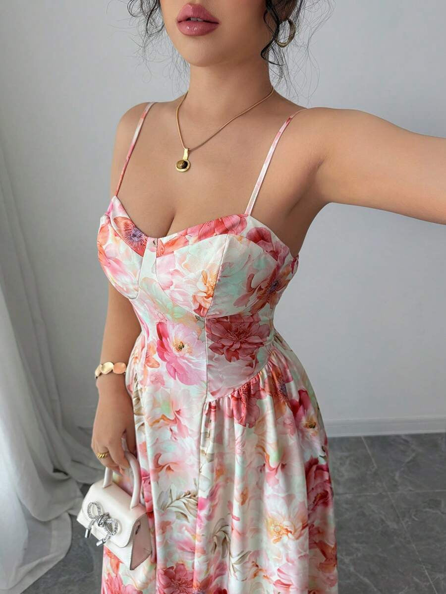 Woman wearing a floral dress with a plain background