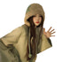 Cream-colored plush winter hat with mint green accents and braided tie, shown with oversized sage sweater