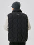Close-up of purple puffer vest showing quilted design, high collar with branded zipper, white logo details, durable stitching