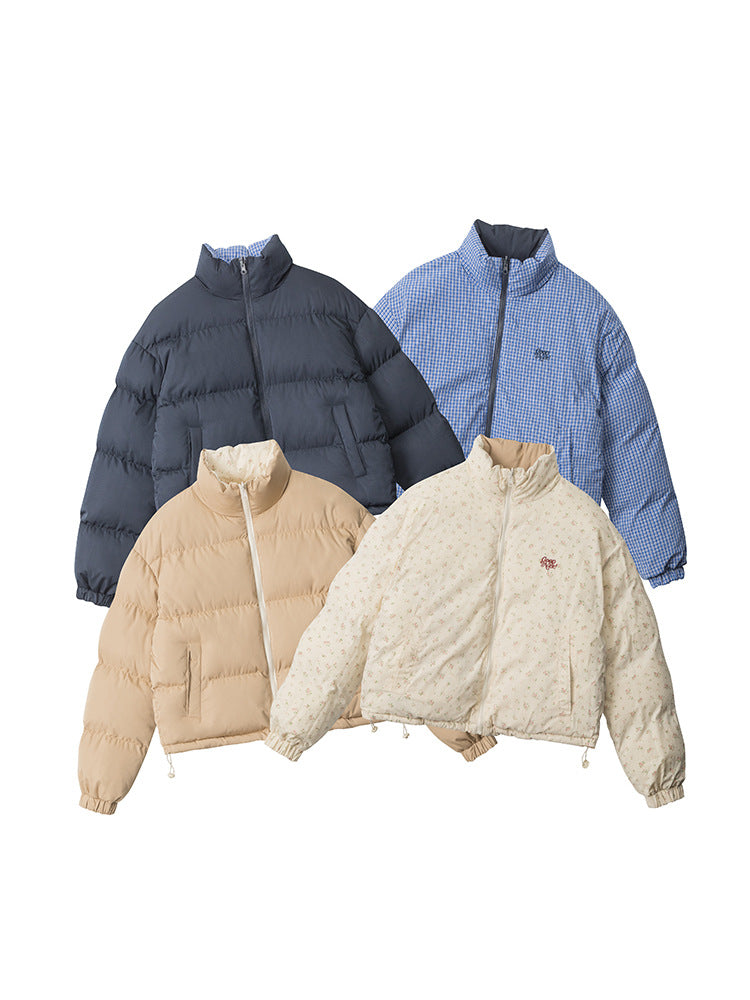 Four puffer jackets in different colors (black, blue plaid, beige, and cream floral) laid flat on a white background