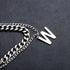 Silver double chain necklace with W pendant