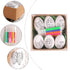 Close-up of an Easter egg painting kit featuring five white eggs with printed butterfly and flower designs, along with six colored markers.