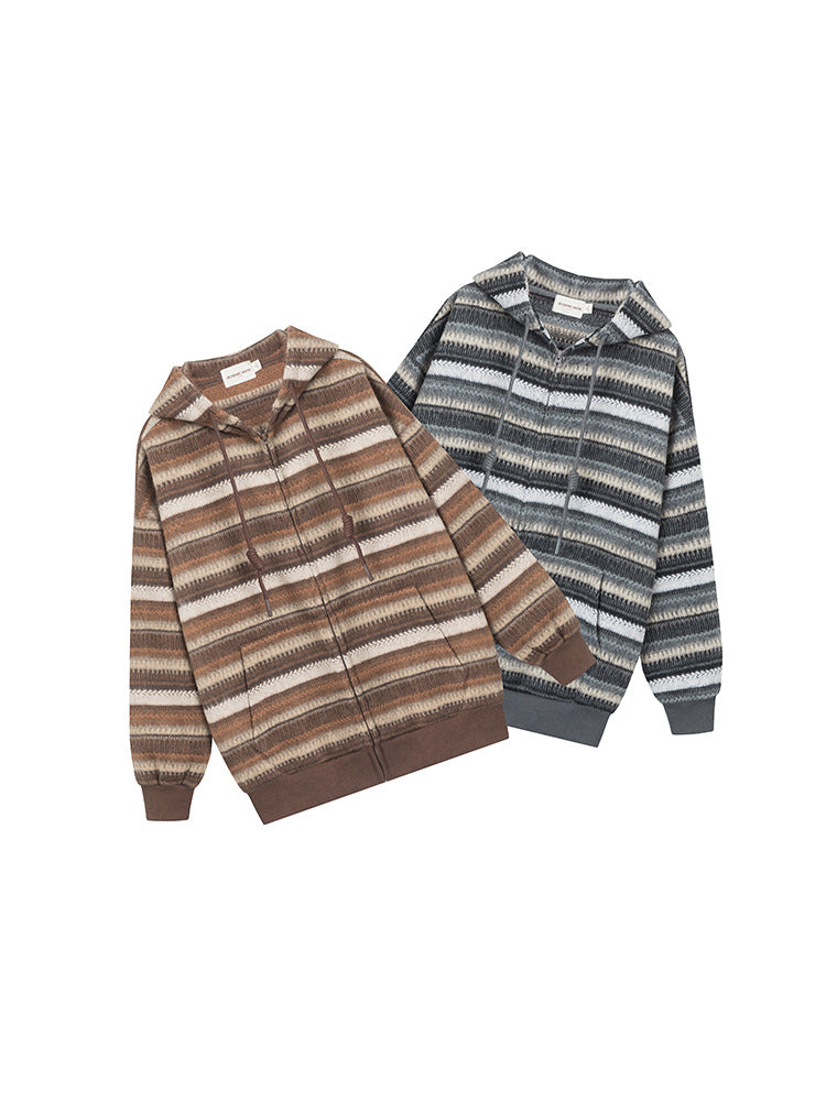Product flat lay showing two color options of striped textured zip hoodies in brown earth tones and grey neutral tones against white background