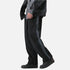 Angled side view of black wide-leg pants showcasing their relaxed fit and slight sheen