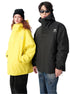 Model in black hooded jacket and yellow windbreaker with contrasting design elements, showcasing streetwear brand versatility
