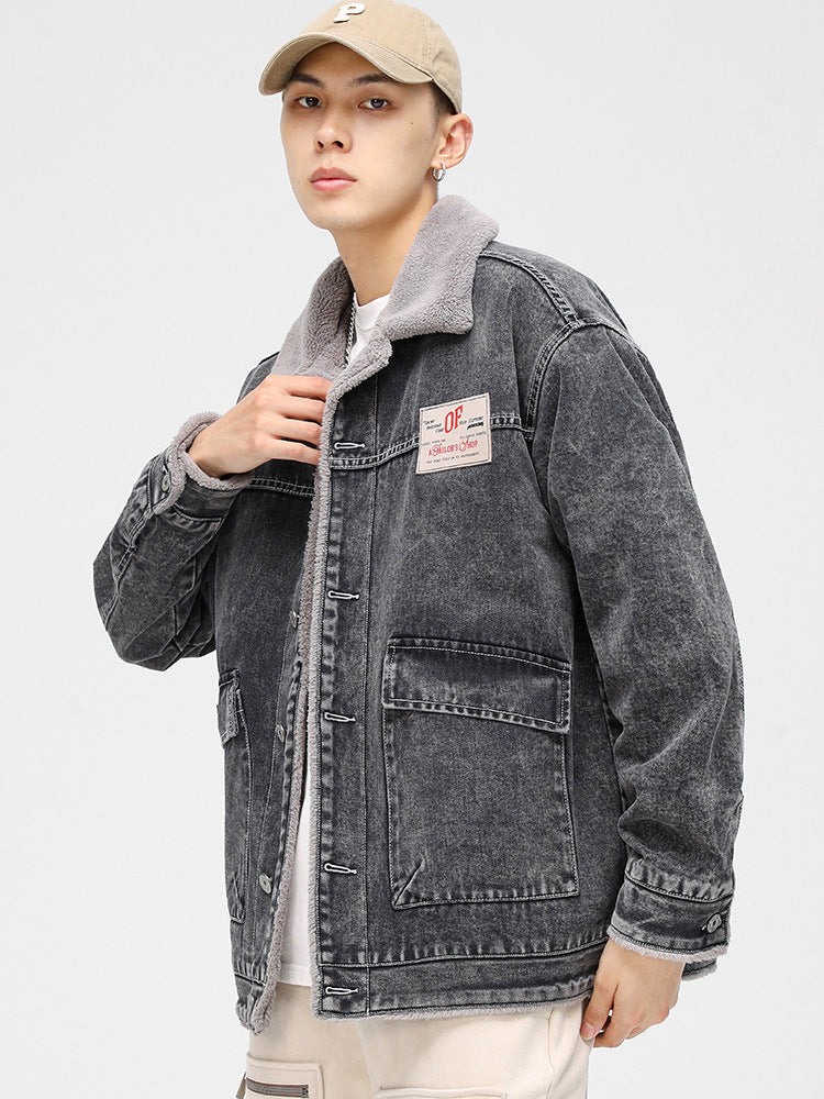 Model in acid wash denim jacket with gray sherpa collar, white tee and beige cap. Features OP Sailor's Shop chest patch