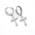 Stainless steel zircon cross hoop earrings pair on white background, showing detailed stone settings