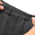 Trouser waistband detail showing belt loops and hook closure on premium pinstripe fabric