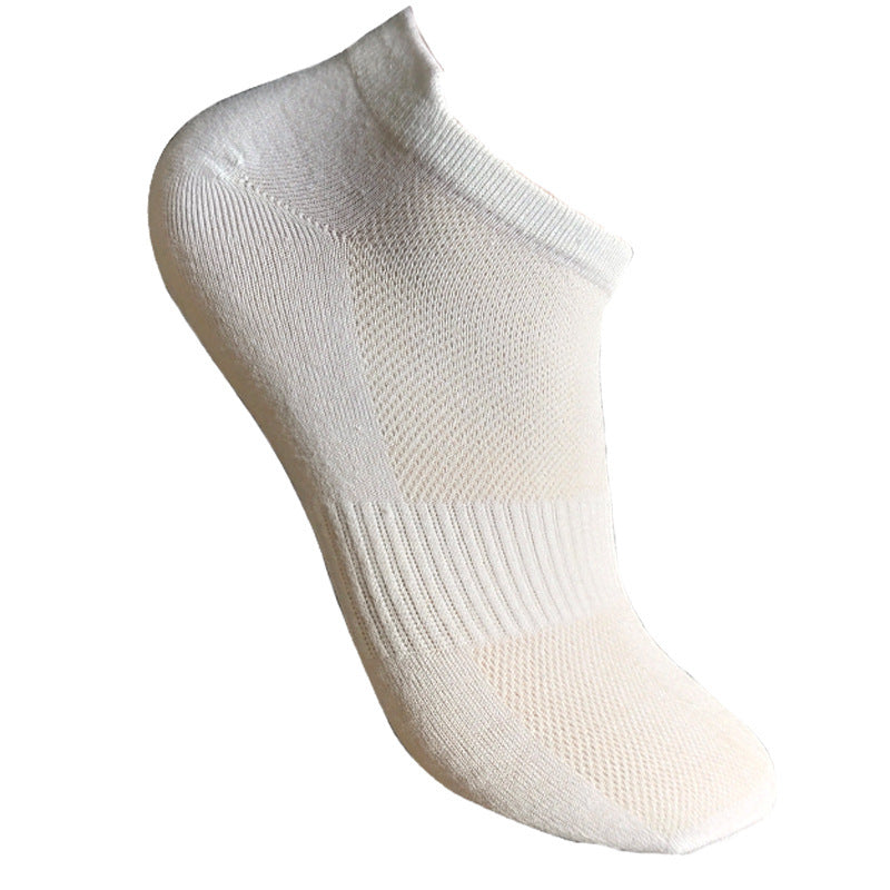White low-cut athletic ankle sock with mesh ventilation panels, reinforced heel and toe, and ribbed elastic cuff against white background