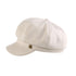 White newsboy cap with small metal emblem shown in product photo against white background