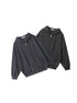 Two black zip-up hoodies are laid flat, showcasing their oversized fit, silver zippers, front pockets, and slight color variations