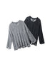 Two cable-knit sweaters with distressed hem details - one in heather grey and one in black, featuring vertical cable patterns and intentional holes along bottom edge
