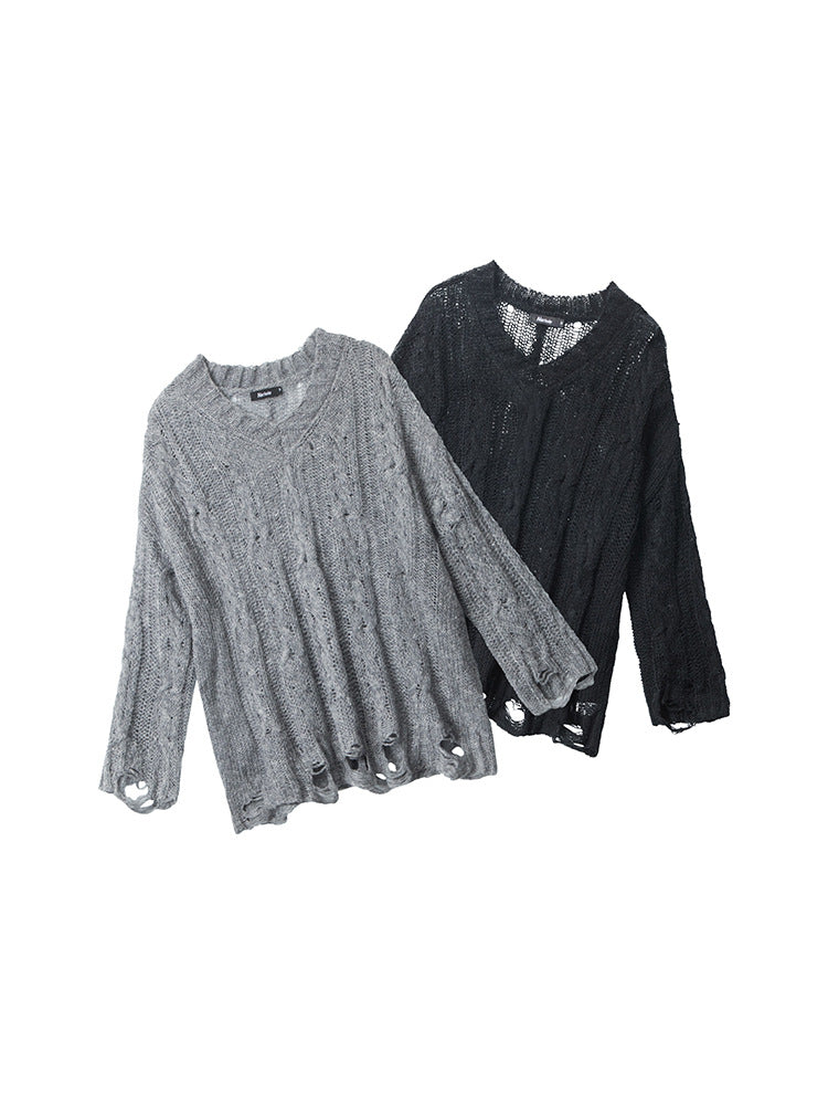 Two cable-knit sweaters with distressed hem details - one in heather grey and one in black, featuring vertical cable patterns and intentional holes along bottom edge