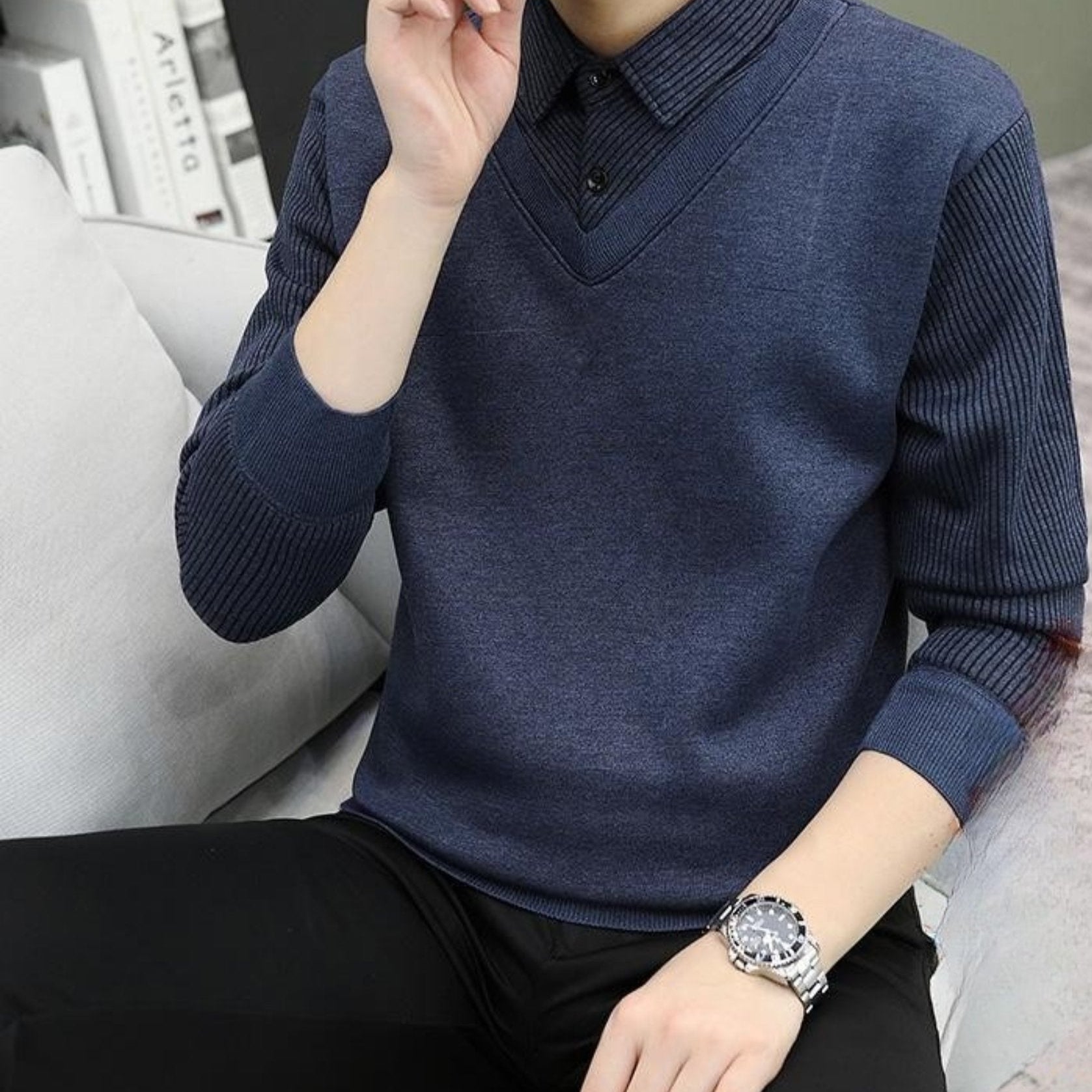 Navy blue V-neck sweater with button-up collar
