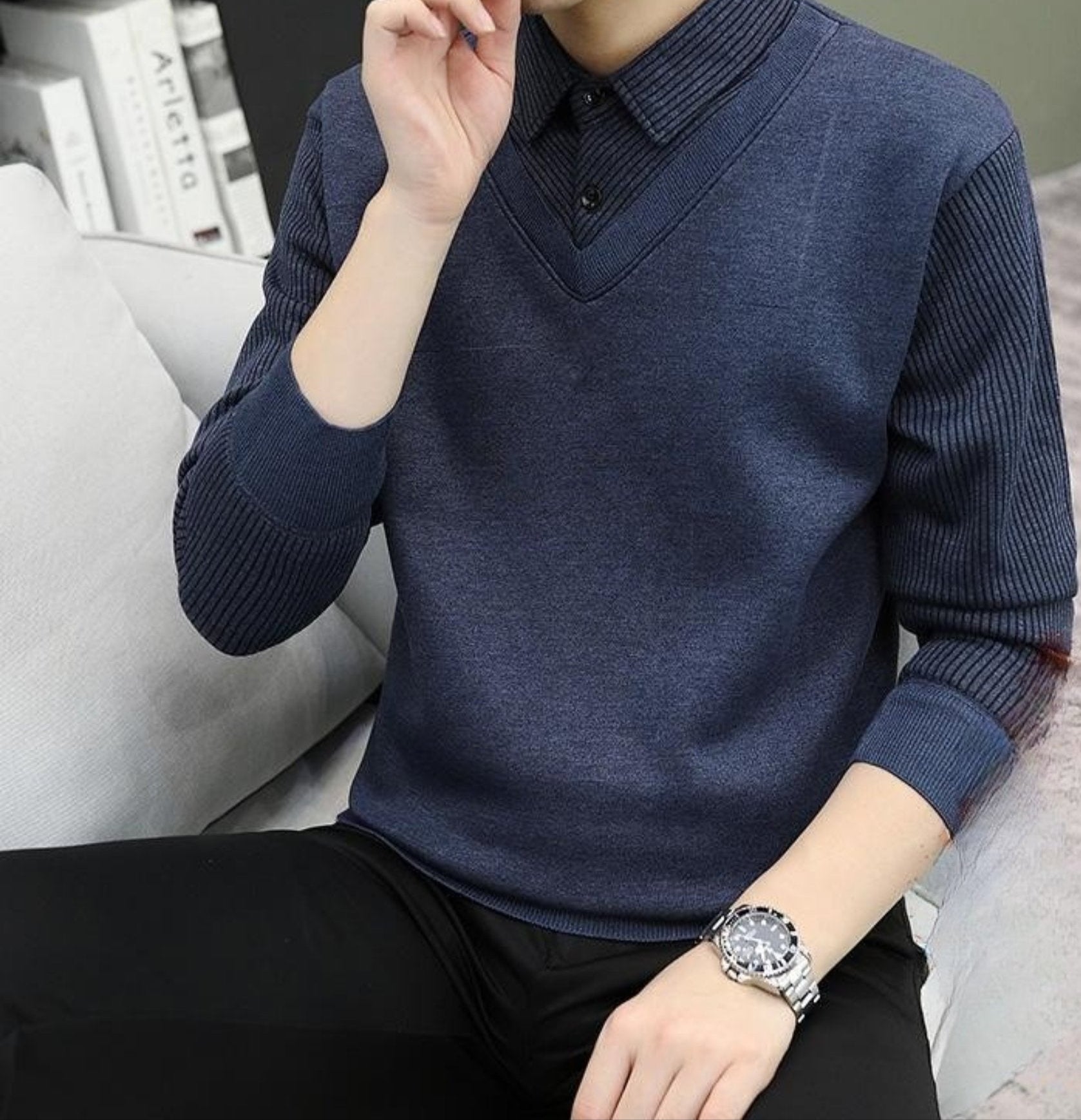 Navy blue V-neck sweater with button-up collar