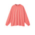 Salmon pink oversized sweatshirt with crew neck, drop shoulders and ribbed cuffs on plain background