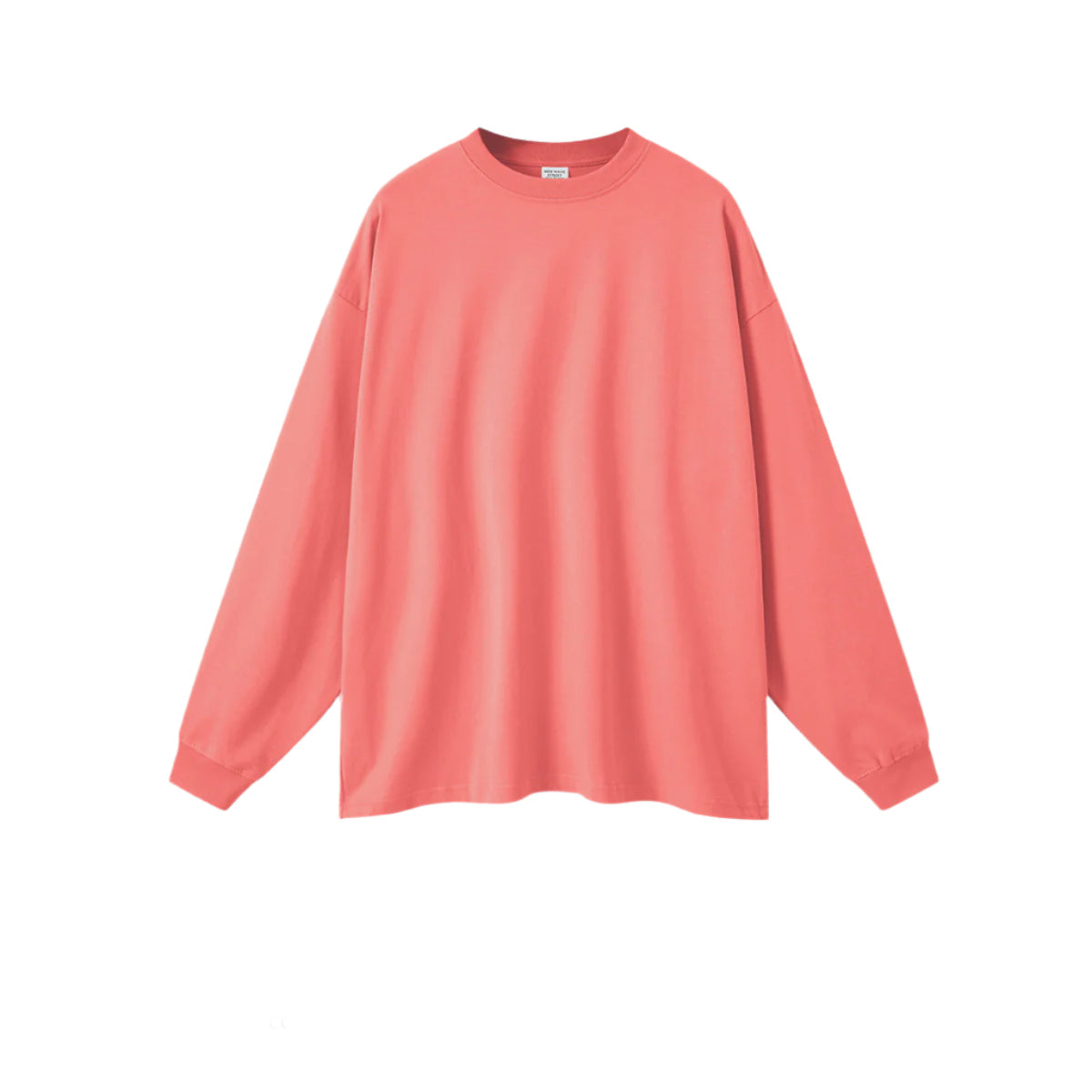 Salmon pink oversized sweatshirt with crew neck, drop shoulders and ribbed cuffs on plain background