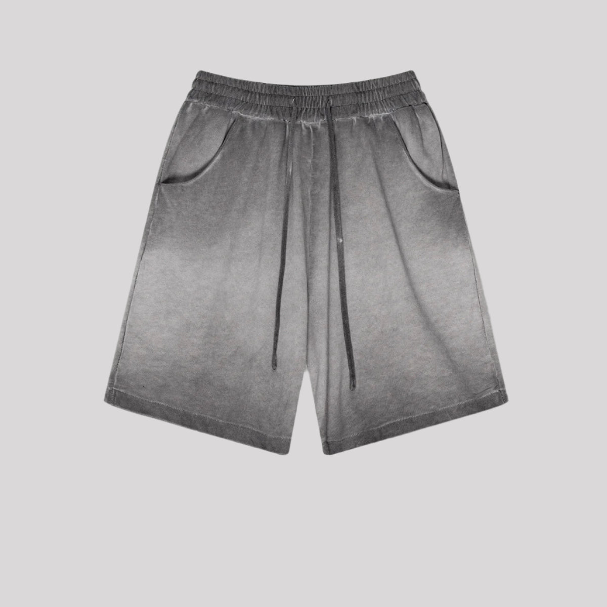 Charcoal gray gradient washed cotton shorts with elastic waistband displayed flat against light gray background