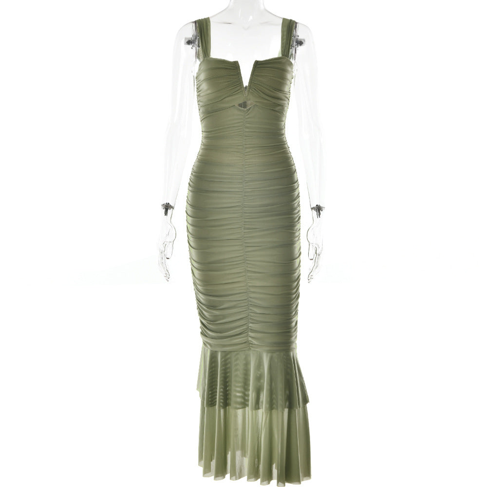 An olive green ruched bodycon dress with sweetheart neckline and tiered hem displayed on transparent mannequin against white background