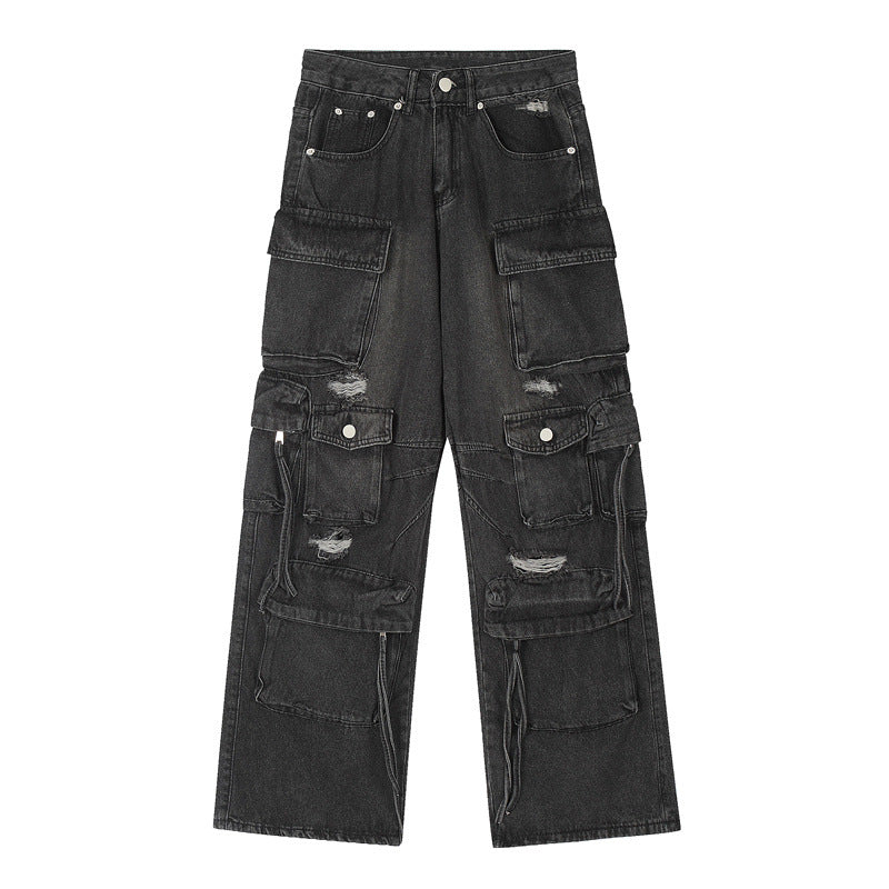 Black distressed cargo jeans with multiple utility pockets and silver button details displayed flat against white background