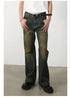 Front view of olive-green wide-leg jeans with unique seam detail and faded wash pattern, styled with white tank top and black belt