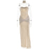 Strapless champagne-colored gown displayed on a transparent mannequin, featuring ruched detailing and a matching choker