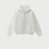 Pure white oversized zip-up hoodie with front kangaroo pocket and ribbed cuffs displayed on light gray background
