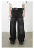 A model wearing a white t-shirt with black stripes on sleeves and ultra-wide black denim jeans with BB logo belt. Features chunky black square-toe shoes