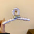 White satin-wrapped hair clip with pearl embellishments