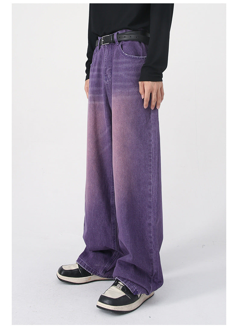 Close-up of purple wide-leg jeans showing pocket and belt detail with black leather belt