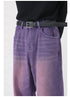A model is wearing purple wide-leg jeans with a black top and leather belt, showing waist-to-thigh view against white background
