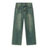 A model is wearing olive green wide-leg denim jeans against white backdrop, front-facing product photography