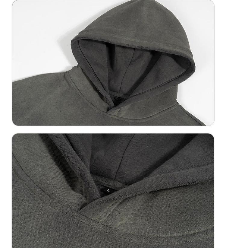 Close-up detail shots of hoodie showing hood construction and fabric texture in grey colorway
