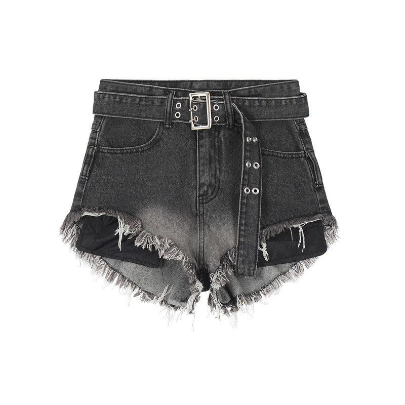 High-waisted denim shorts with distressed frayed hem, grommet belt detail, and faded black wash on white background