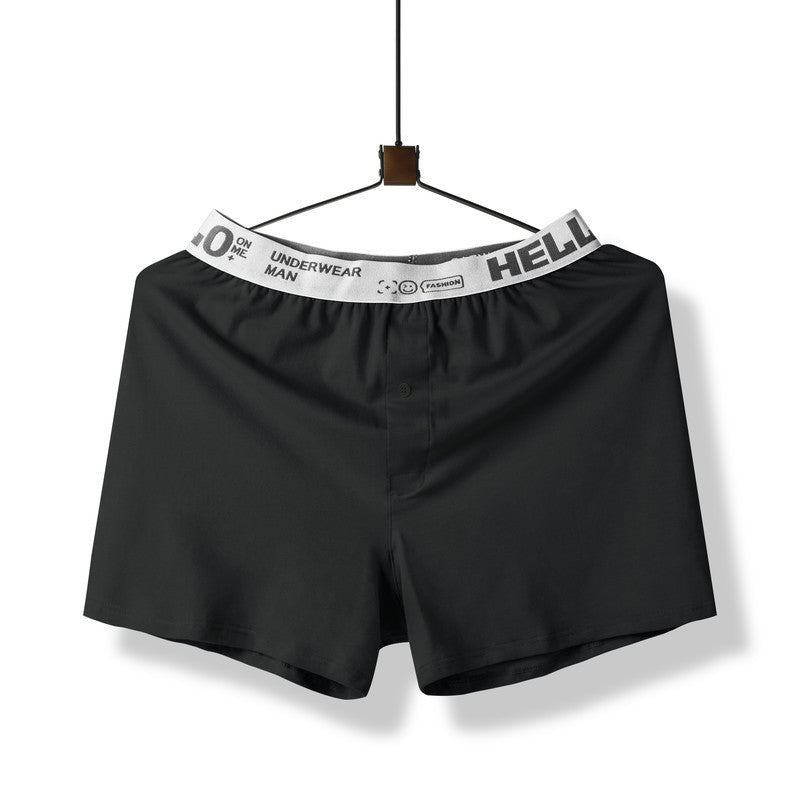Black boxer short with white waistband reading 'HELLO' and 'UNDERWEAR MAN', displayed on hanger against white background