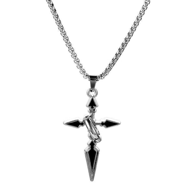 Silver cross pendant featuring black enamel arrow-tip design on thick box chain against white background, product detail shot