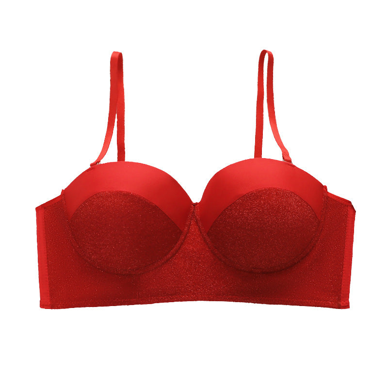 Front view of red glitter bustier bra with molded cups and adjustable straps on white background