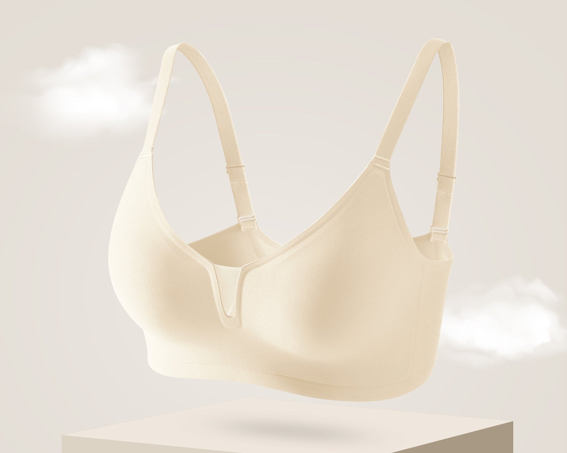Beige seamless bra with thin support and U-shaped front.