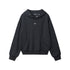 Black hooded sweatshirt with curved seam design, snap-button hood detail, embroidered eye logo on chest, and ribbed cuffs