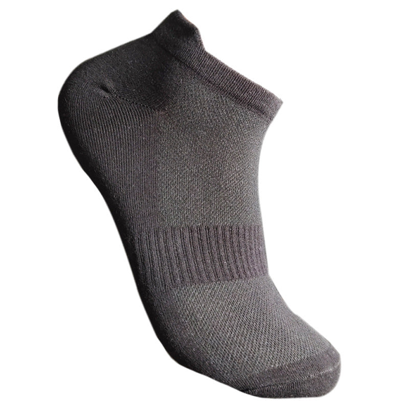Black athletic ankle sock with ventilated mesh design, reinforced sole area and contoured fit against white background
