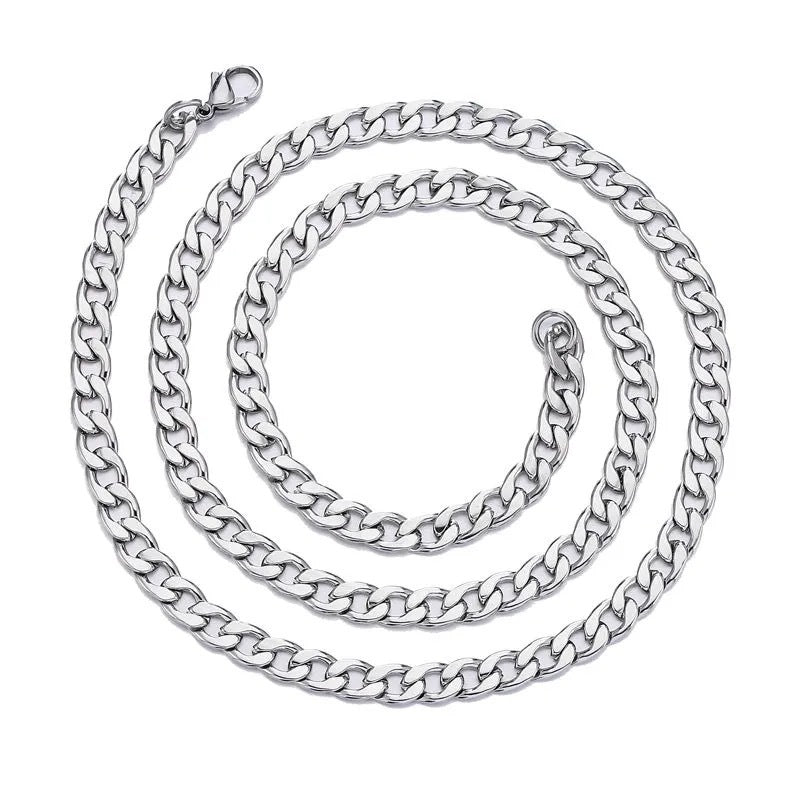 Classic silver curb chain necklace with lobster clasp closure laid flat on white background