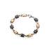  A full view of the black and gold stainless steel bracelet against a white background, highlighting its sleek and modern design.