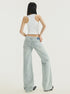 Back view, full-body shot: Straight-leg low-rise jeans in light denim with classic pockets.