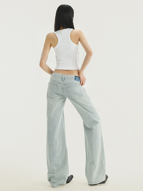 Back view, full-body shot: Straight-leg low-rise jeans in light denim with classic pockets.