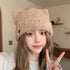 Model Wearing Beige Cat Ear Beanie Hat Indoors – Fashionable beige cat ear beanie hat styled with long hair, perfect for winter fashion