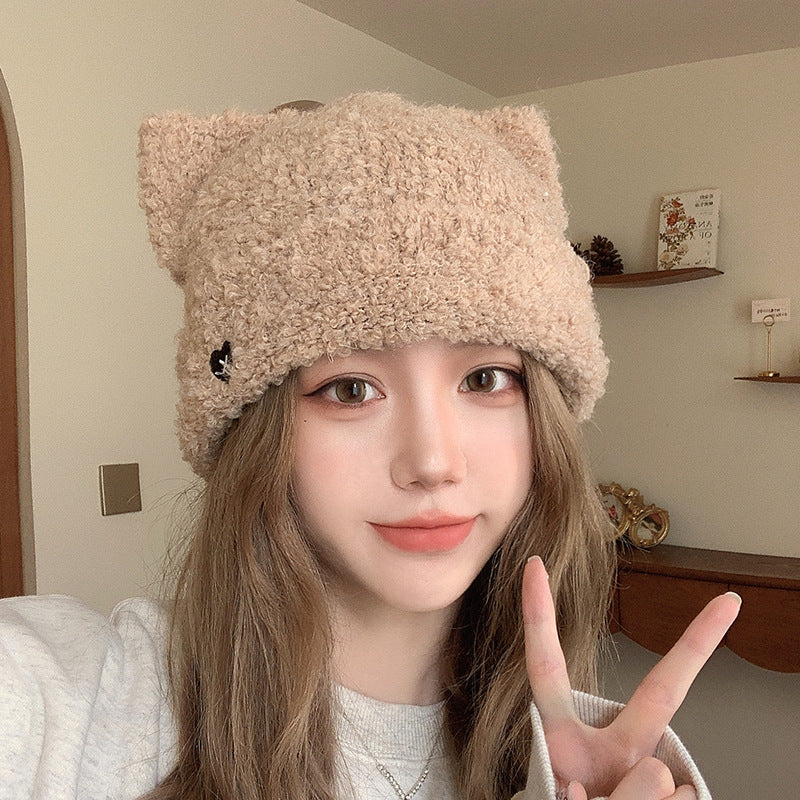 Model Wearing Beige Cat Ear Beanie Hat Indoors – Fashionable beige cat ear beanie hat styled with long hair, perfect for winter fashion