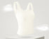 White ribbed tank top with built-in bra, featuring a seamless and breathable design.