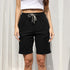 Front view of black bermuda shorts with white drawstring, classic casual design
