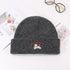 Charcoal gray beanie with red Lucky Pipiegg text and white puppy embroidery